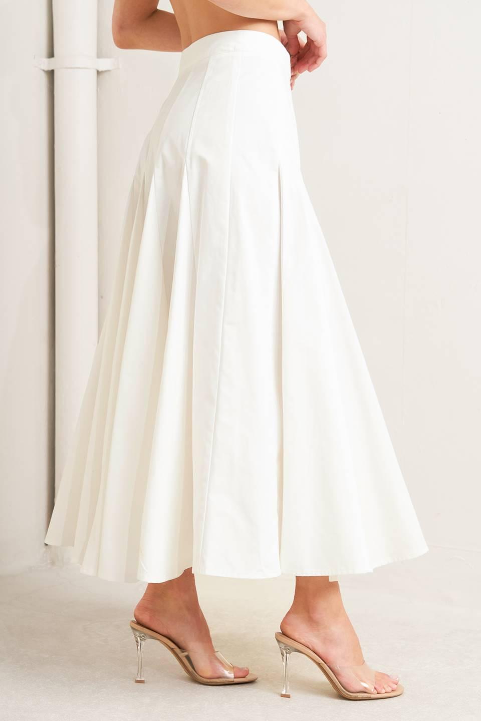 White woven circle skirt by Flying Tomato featuring a pale frame design, displayed on a neutral background.
