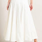 White woven circle skirt by Flying Tomato featuring a pale frame design, displayed on a neutral background.