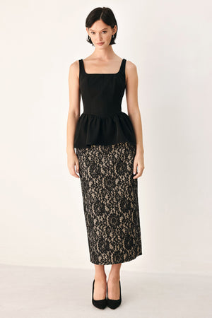 Black lace pencil midi skirt by Flying Tomato, featuring intricate lace details and a fitted silhouette for a stylish look.