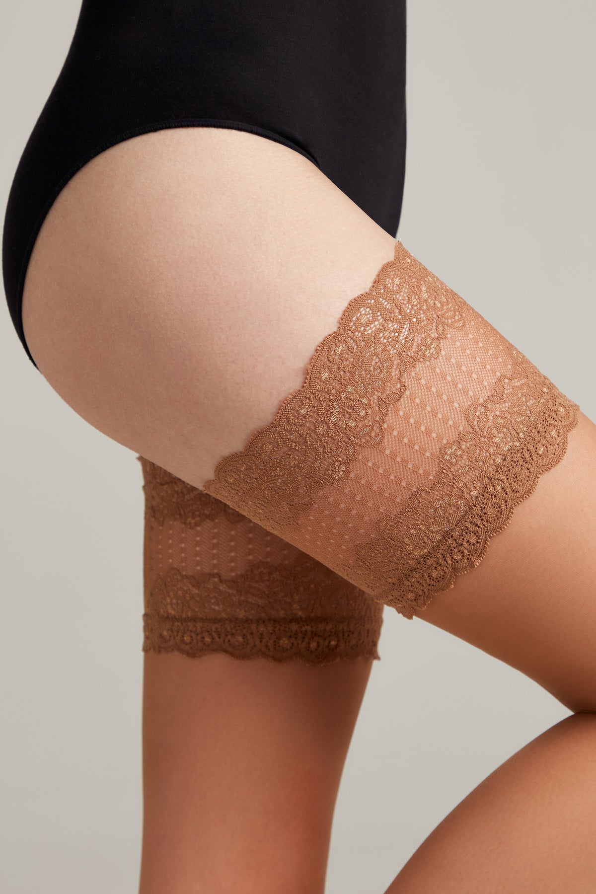 Fantasy Stockings Conte Flame silicone lace-top women's stockings in bronze tone