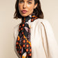 Bruna (black/orange)- Soft and lightweight Italian foulard from pure silk