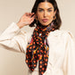 Bruna (black/orange)- Soft and lightweight Italian foulard from pure silk