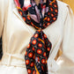 Bruna (black/orange)- Soft and lightweight Italian foulard from pure silk