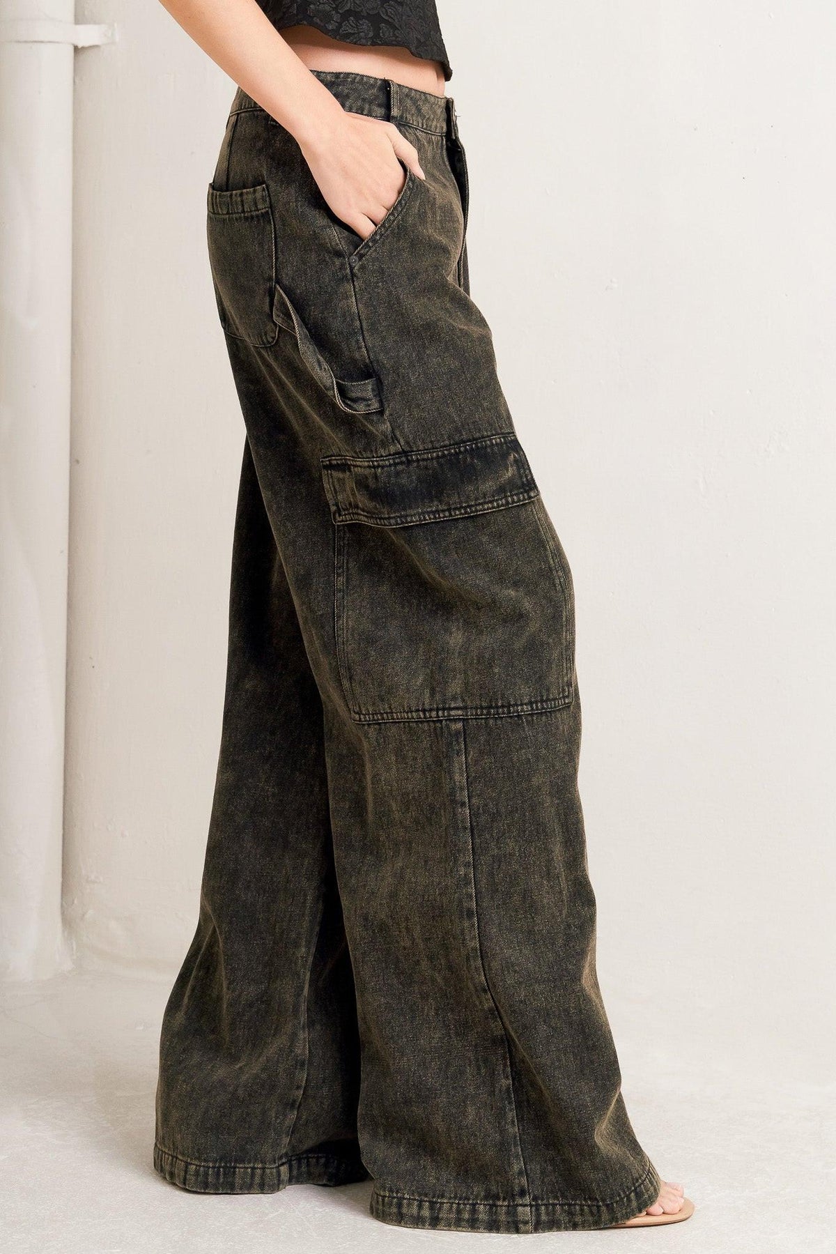 Black Flying Tomato Can't Blame Me Gargo denim pants with a stylish fit and detailed stitching, displayed on a plain background.