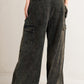 Black Flying Tomato Can't Blame Me Gargo Denim Pants with distressed details and classic five-pocket design.