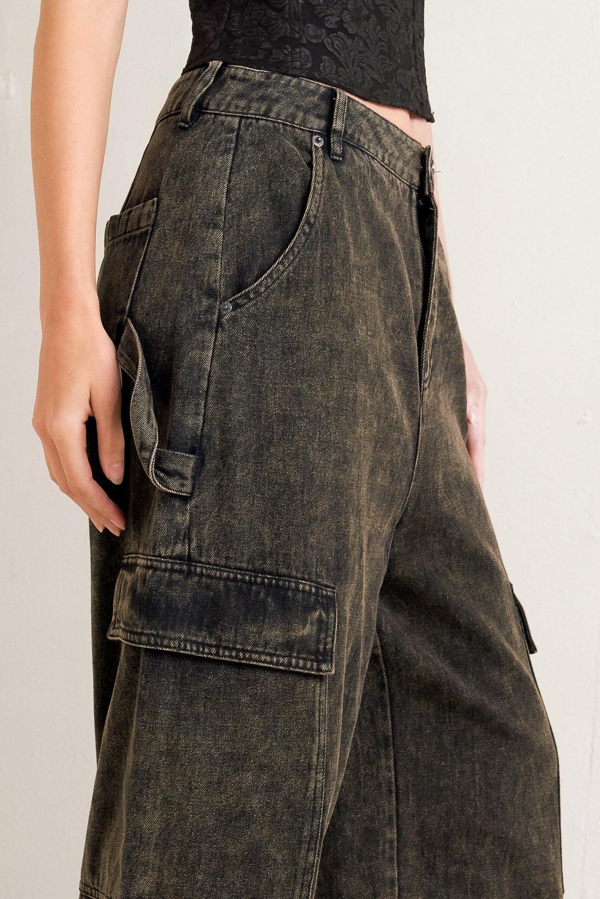 Flying Tomato Can't Blame Me Gargoyle denim pants in black showing front view with classic five-pocket style.