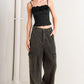 Black Can't Blame Me Gargoyle denim pants by Flying Tomato, featuring a stylish design and classic fit.