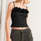 Black Flying Tomato Can't Blame Me Gargoyle denim pants with distressed details and stylish fit, shown on a model.