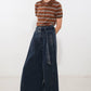 Flying Tomato Sail On By denim pants in indigo, showcasing relaxed fit and classic denim style with visible stitching and pockets.