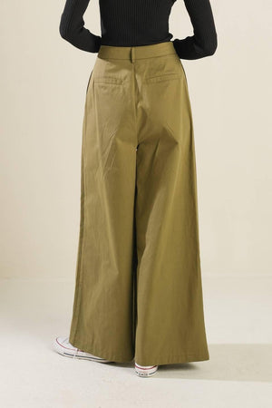 Olive green woven pants from Flying Tomato's Hidden Reflections collection, featuring a relaxed fit and stylish design.