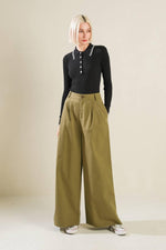Olive green woven pants from Flying Tomato's Hidden Reflections collection, featuring a relaxed fit and stylish design.