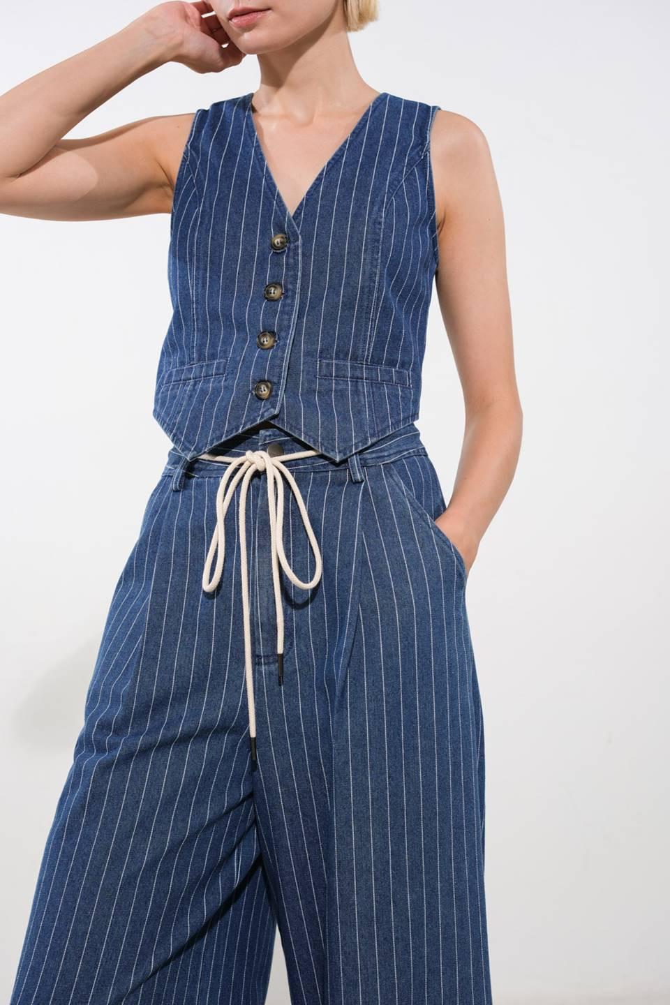 Flying Tomato I Still Believe denim pants in medium indigo, showcasing classic straight-leg design and durable denim fabric.