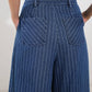 Medium indigo Flying Tomato I Still Believe denim pants showing a relaxed fit and classic five-pocket design.