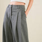 Flying Tomato Wanna Be Loved woven pants in grey and white with a relaxed fit, showcasing their soft, stylish fabric and design.
