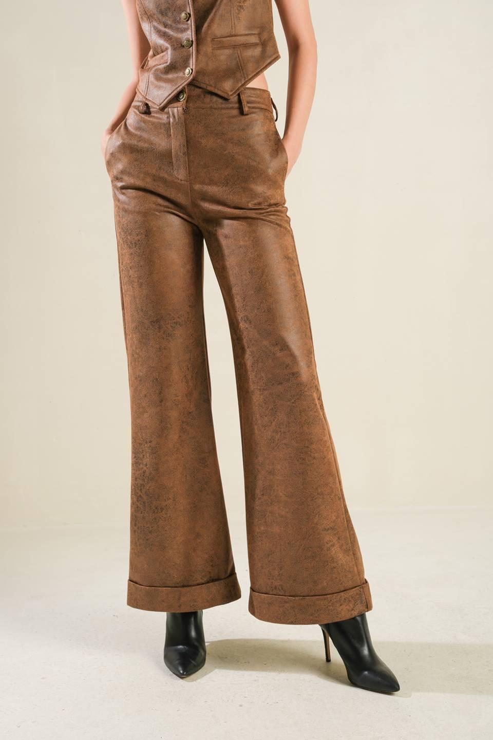 Brown leather pants by Flying Tomato, featuring a stylish fit and detailed stitching, perfect for a fashionable look.