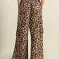 Taupe brown woven pants by Flying Tomato, stylish and comfortable women's pants, with a relaxed fit and textured fabric.