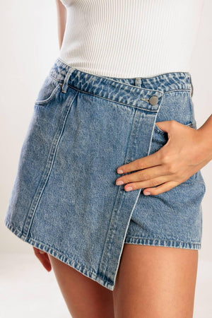 Flying Tomato denim skort shorts in blue with a casual style, featuring front pockets and a button closure.