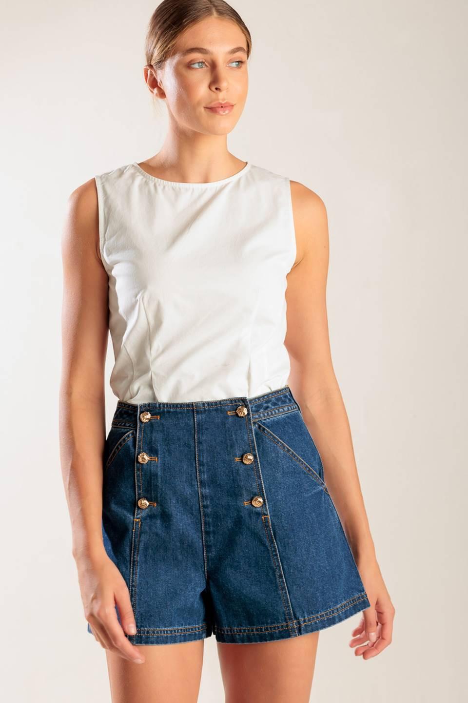 Flying Tomato denim shorts with a classic drive-in movie print, casual fit, and distressed detailing in indigo denim.