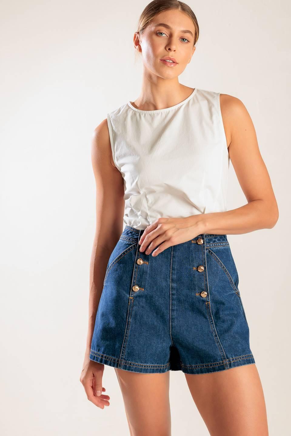 Flying Tomato denim shorts with a classic indigo wash, featuring a relaxed fit and stylish cuffed hem.