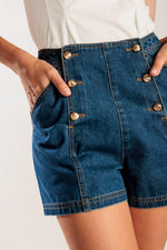 Flying Tomato denim shorts with a relaxed fit, featuring a classic design and indigo wash, perfect for casual summer wear.
