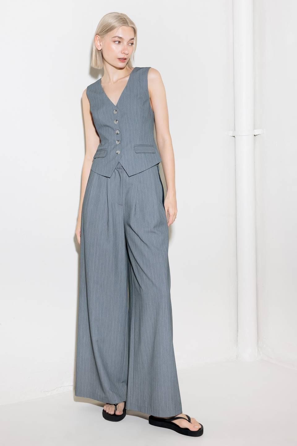 Flying Tomato Smile Bright grey woven pants for women, showcasing relaxed fit and stylish woven fabric design.