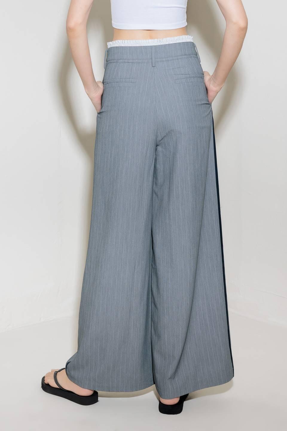 Flying Tomato Smile Bright grey woven pants, casual pants with a relaxed fit, shown on a model with a neutral background.