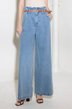 Light denim Flying Tomato Kissed by Sunlight denim pants with classic five-pocket design and relaxed fit.