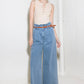 Light denim Flying Tomato Kissed by Sunlight denim pants, showcasing classic fit and stylish stitching on the front.