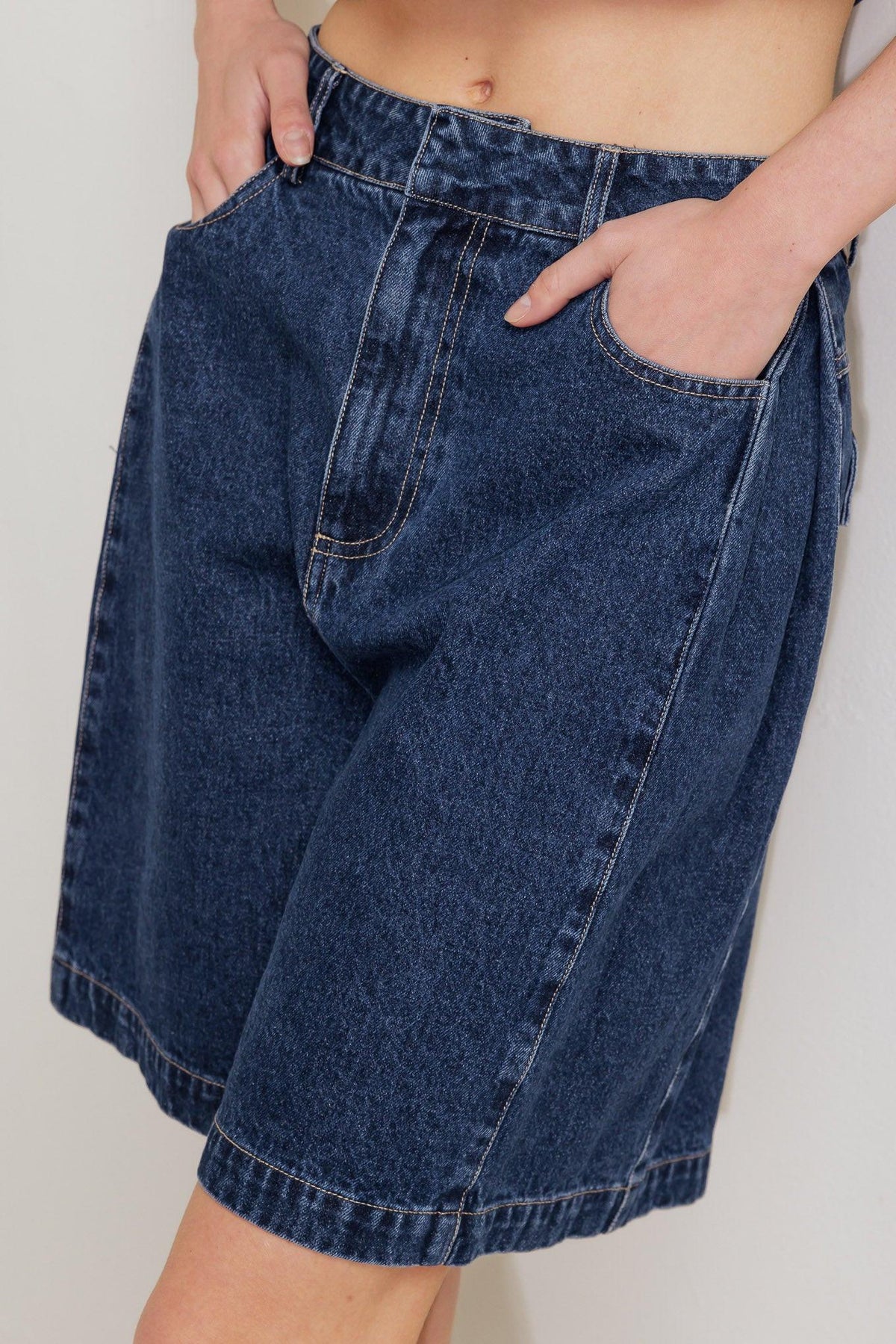 Flying Tomato coffee petal denim shorts, casual denim shorts with a floral petal pattern and distressed details.