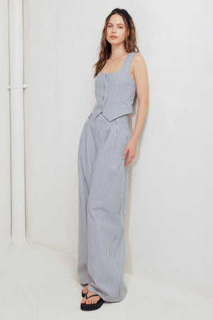 Flying Tomato Coastal Chic woven pants in white and navy, showing relaxed fit and detailed woven fabric.