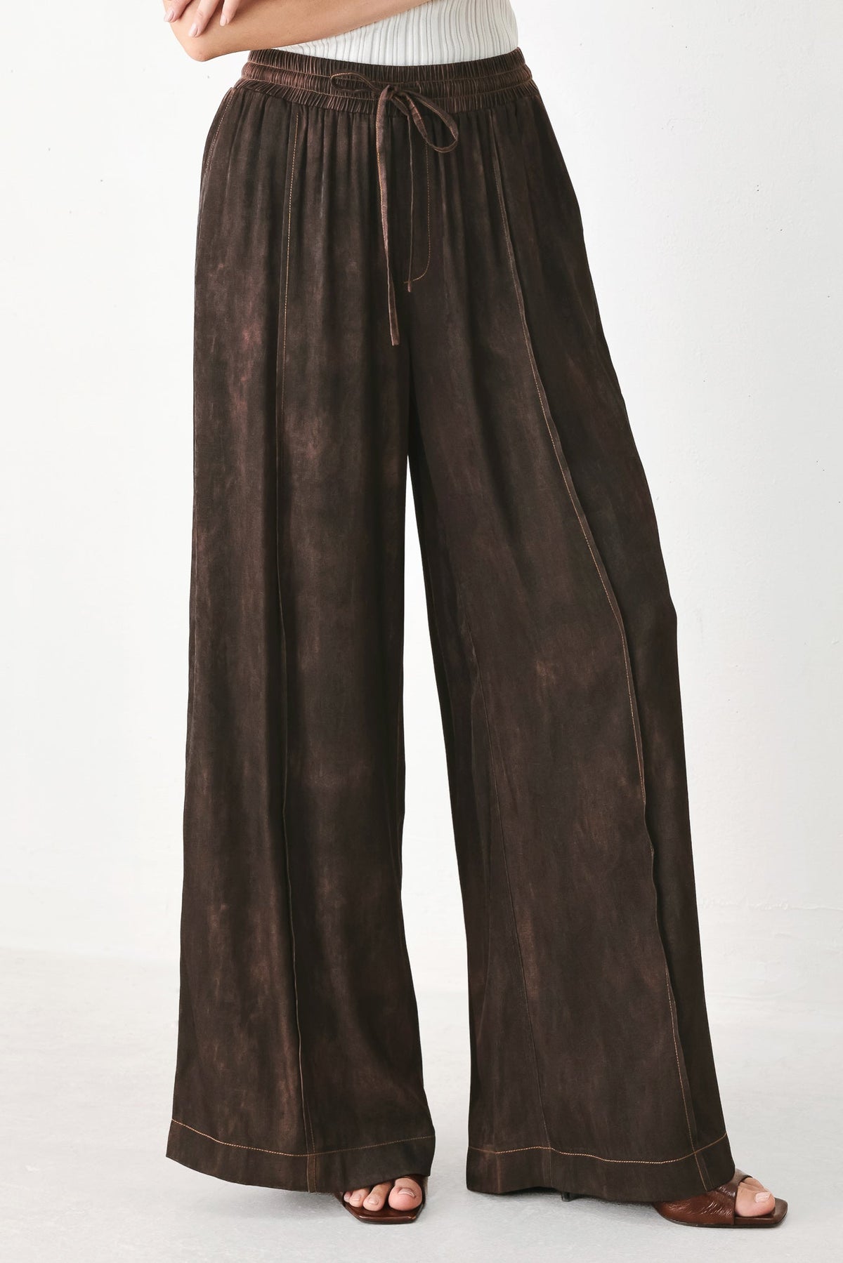 Dark brown Flying Tomato Sable Lounge Woven Pants with relaxed fit and soft fabric, displayed on a neutral background.