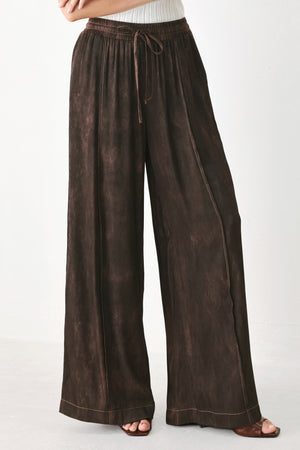Dark brown Flying Tomato Sable Lounge Woven Pants with relaxed fit and soft fabric, displayed on a neutral background.