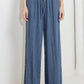 Flying Tomato offline edge indigo denim pants with classic five-pocket design and straight-leg fit, displayed on a mannequin.