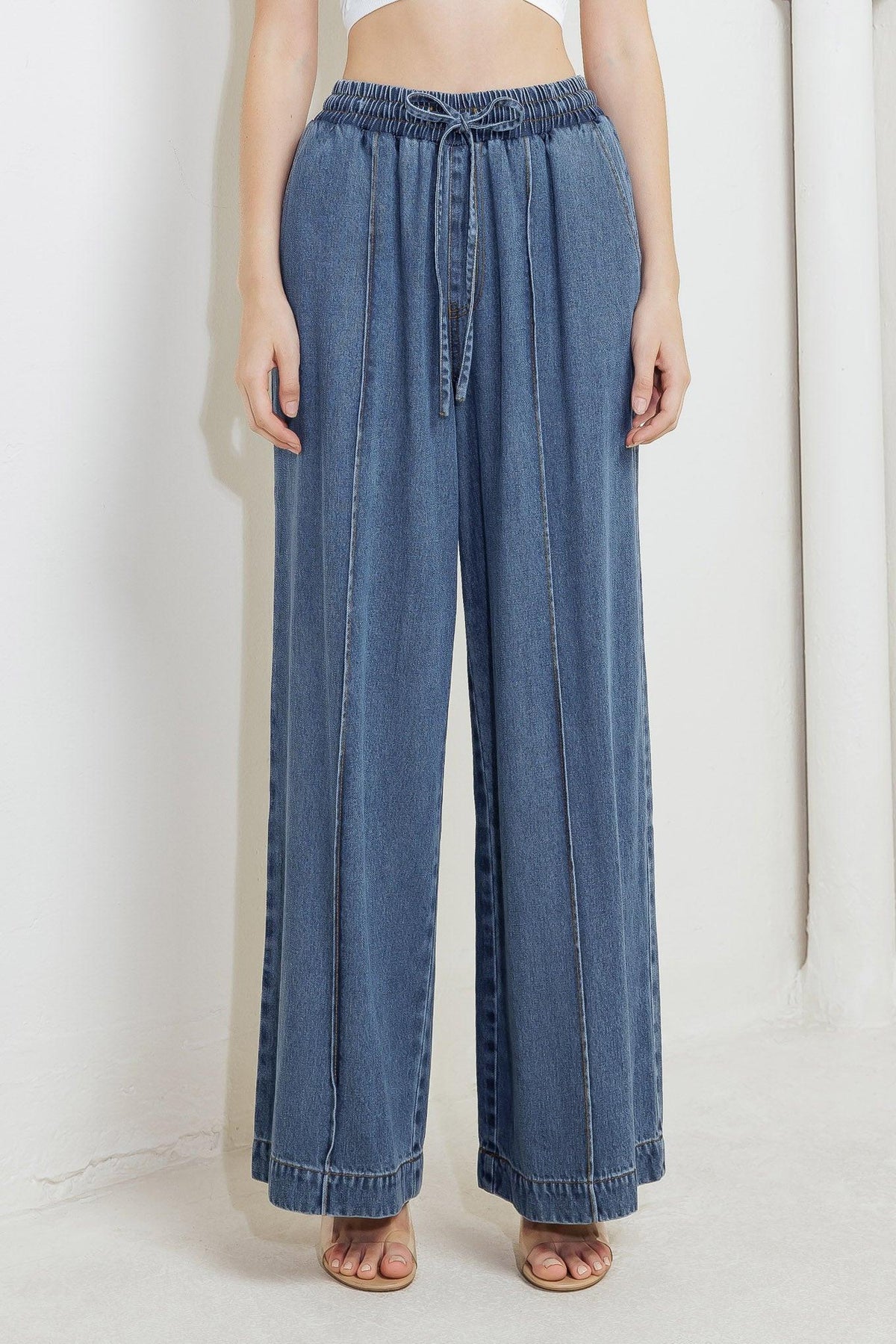 Flying Tomato offline edge indigo denim pants with classic five-pocket design and straight-leg fit, displayed on a mannequin.