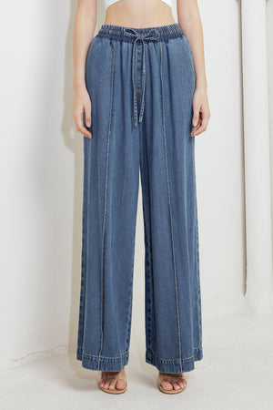Flying Tomato offline edge indigo denim pants with classic five-pocket design and straight-leg fit, displayed on a mannequin.