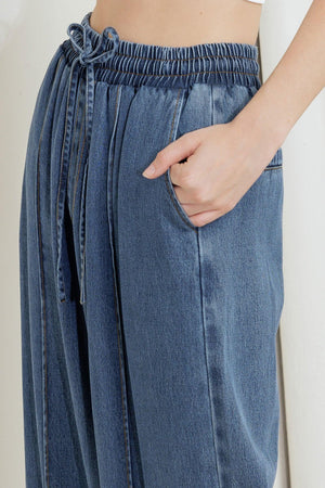 Flying Tomato offline edge indigo denim pants with classic five-pocket design and straight-leg fit, shown on a mannequin.