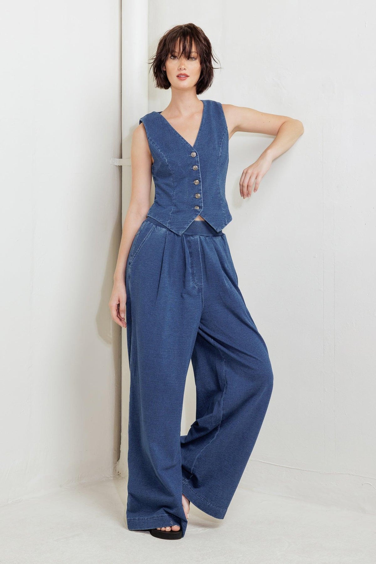 Flying Tomato urban indigo French Terry denim pants with relaxed fit and classic five-pocket design, shown on model.