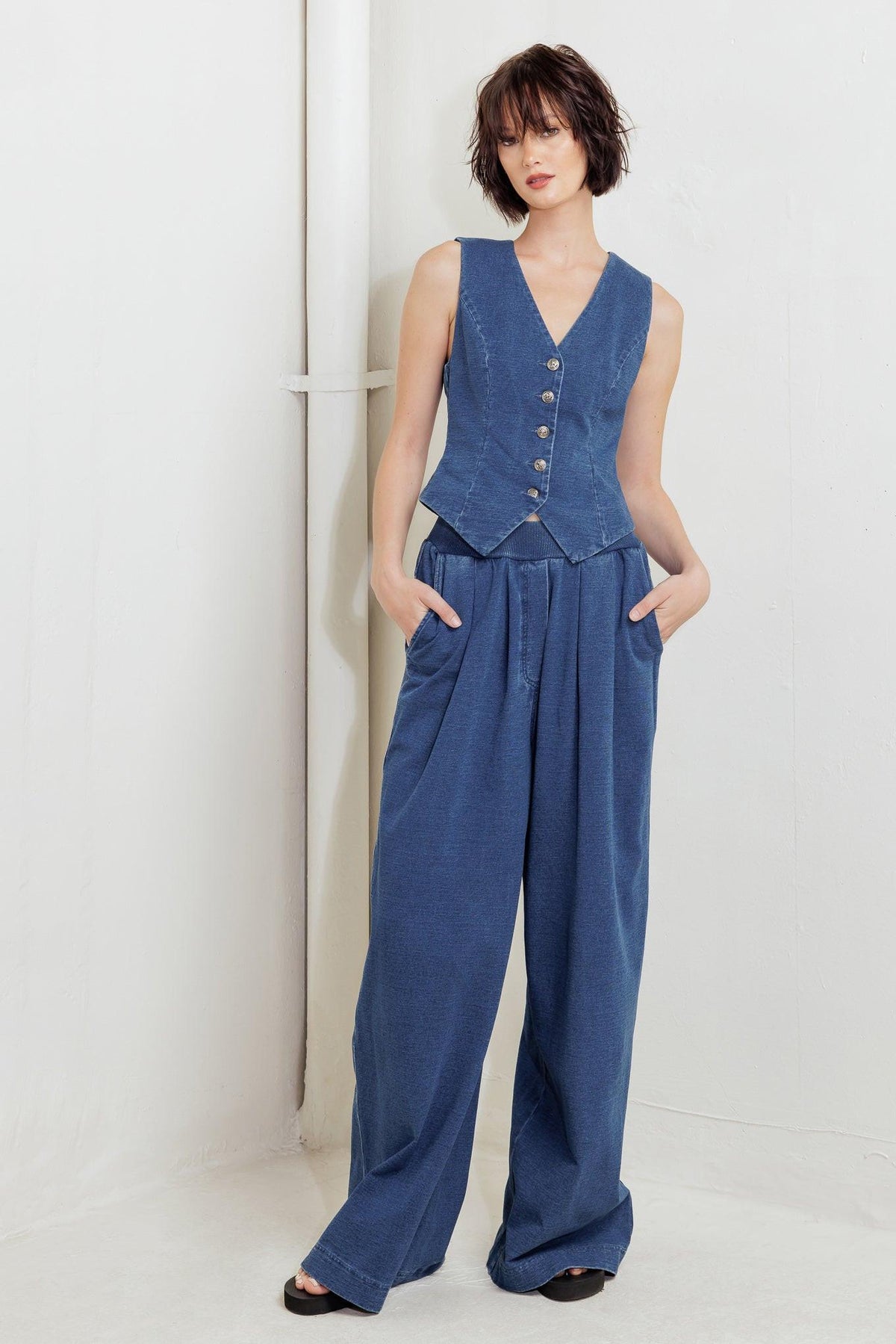 Flying Tomato urban indigo French terry denim pants with a relaxed fit and stylish design, shown on a model.