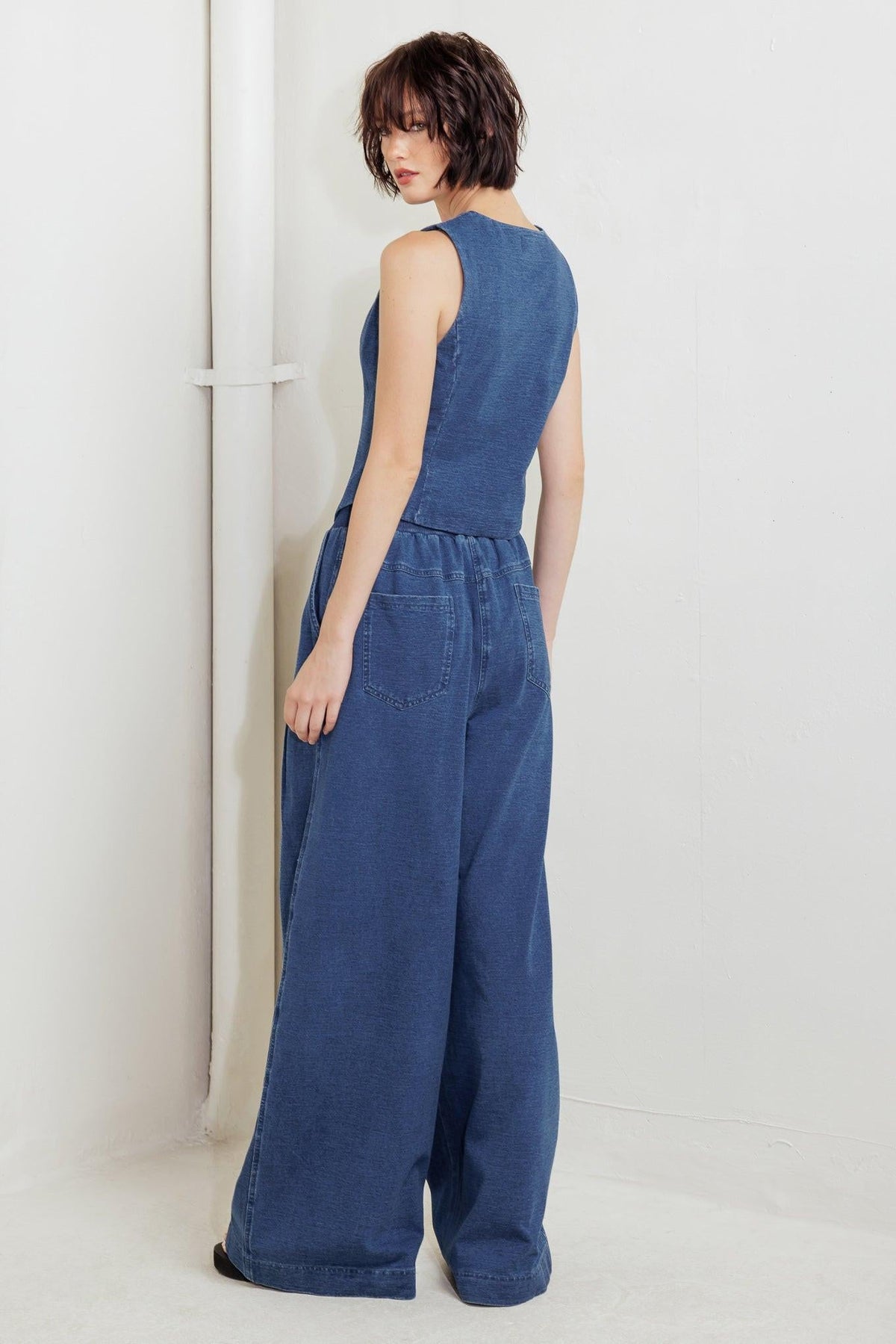 Flying Tomato urban indigo French terry denim pants with relaxed fit and stylish design, shown in dark blue denim fabric.