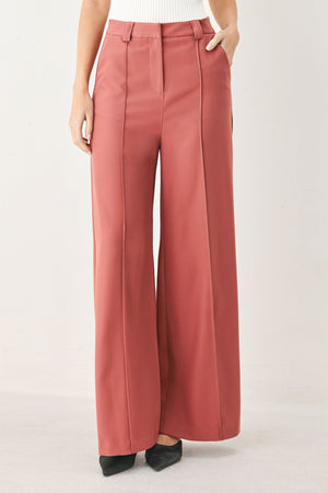Flying Tomato Modern Flow Woven Pants in dried rose color, featuring a relaxed fit and woven fabric design.