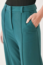 Flying Tomato Modern Flow woven teal pants with a relaxed fit and stylish design, perfect for casual or trendy outfits.