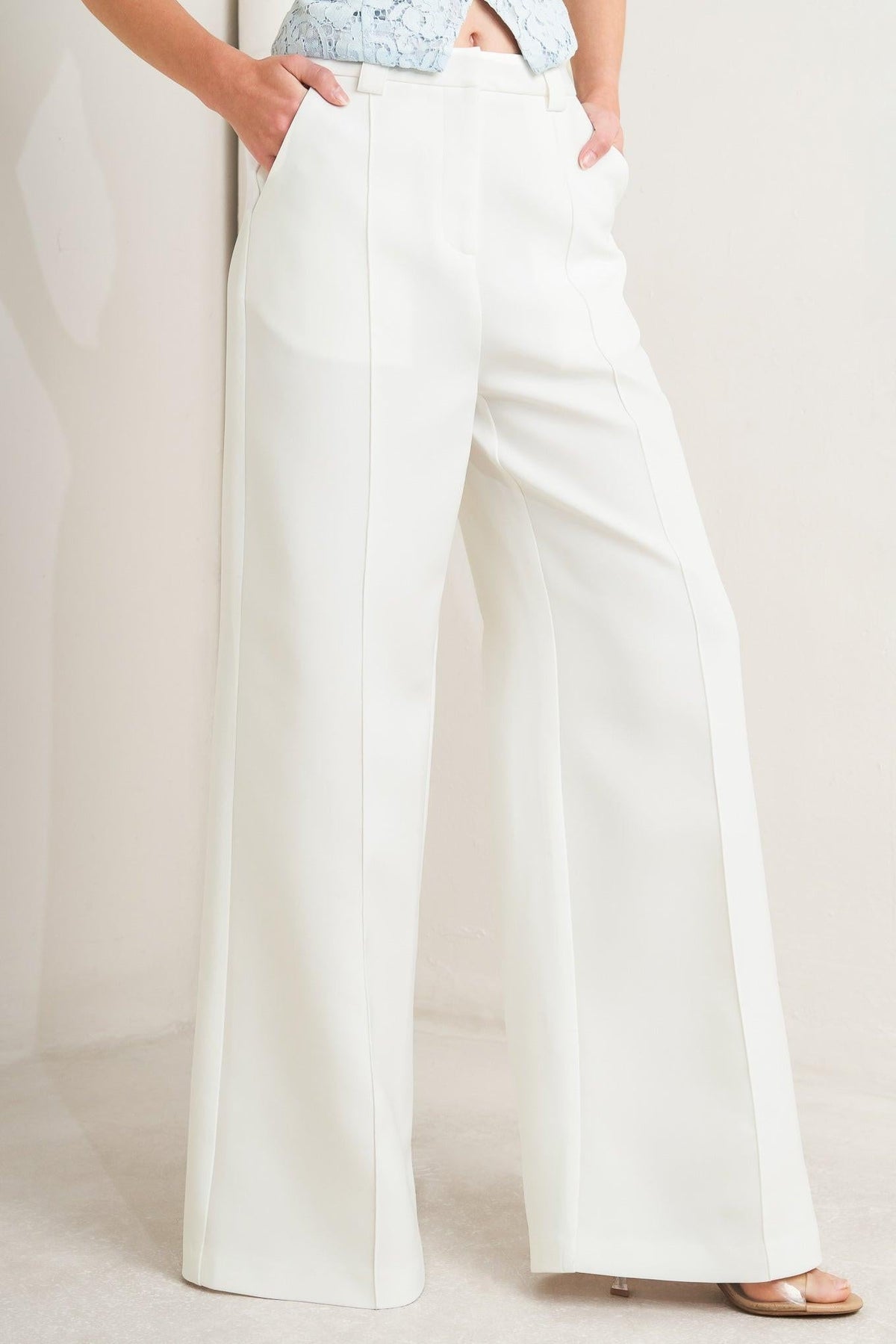Flying Tomato Bright Moments woven pants in white, casual pants with a relaxed fit and woven fabric, displayed on a model.