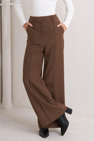 Flying Tomato Monday Flow brown woven pants, lightweight and comfortable, featuring a relaxed fit with a textured fabric.