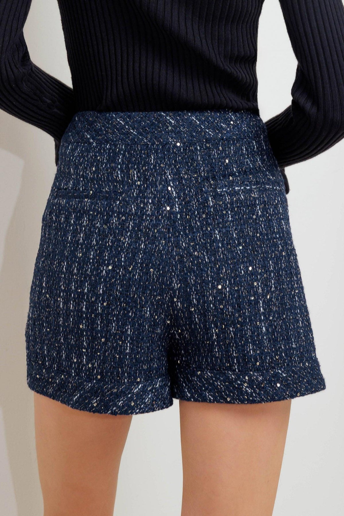 Flying Tomato Parisian Navy Tweed Skort shorts, stylish navy tweed fabric with a fitted waist and layered skirt design.