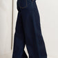 Flying Tomato Euro City denim pants showing classic blue denim with front pockets and a tapered fit.