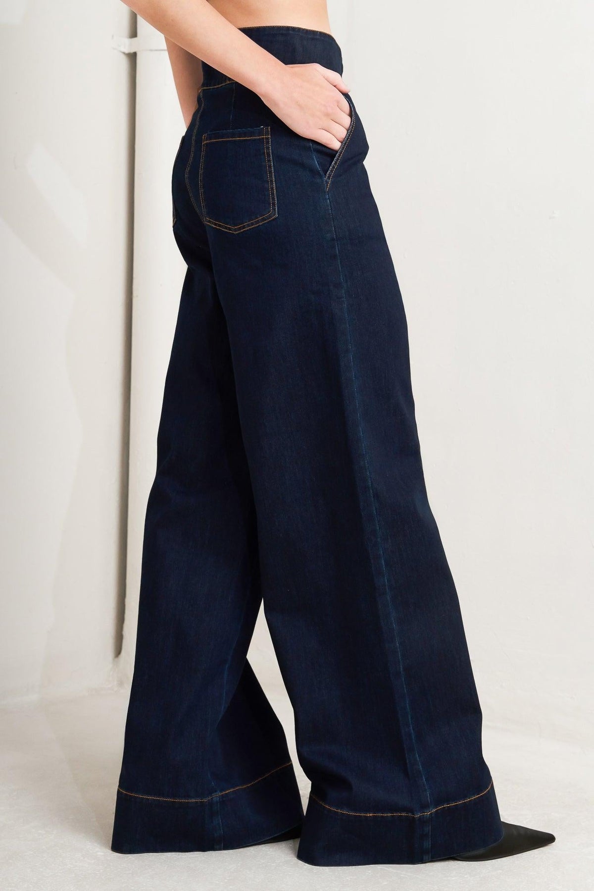 Flying Tomato Euro City denim pants showing classic blue denim with front pockets and a tapered fit.