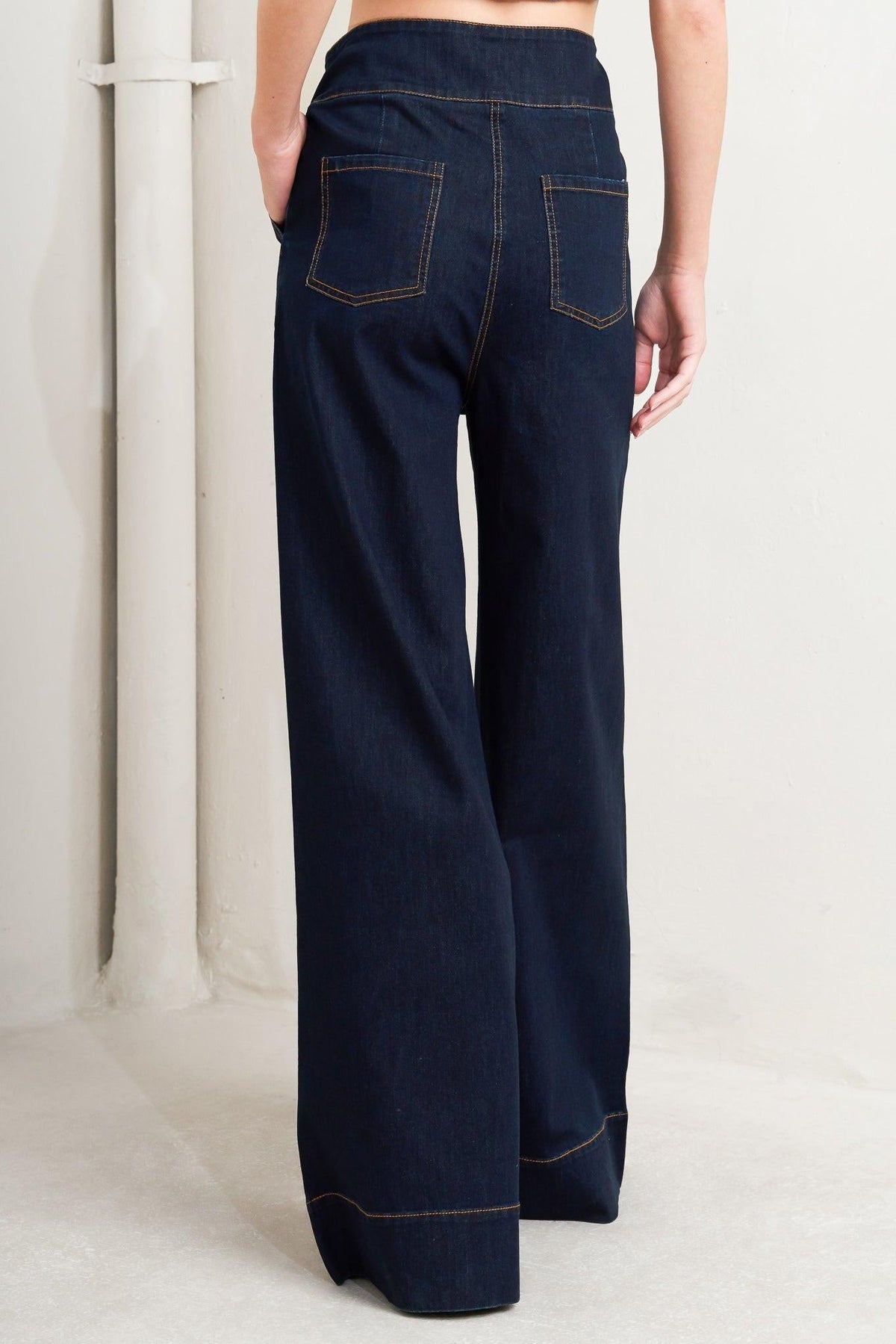 Flying Tomato Euro City denim pants featuring classic blue denim with front and back pockets, slim fit design.