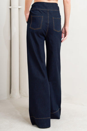 Flying Tomato Euro City denim pants featuring classic blue denim with front and back pockets, slim fit design.