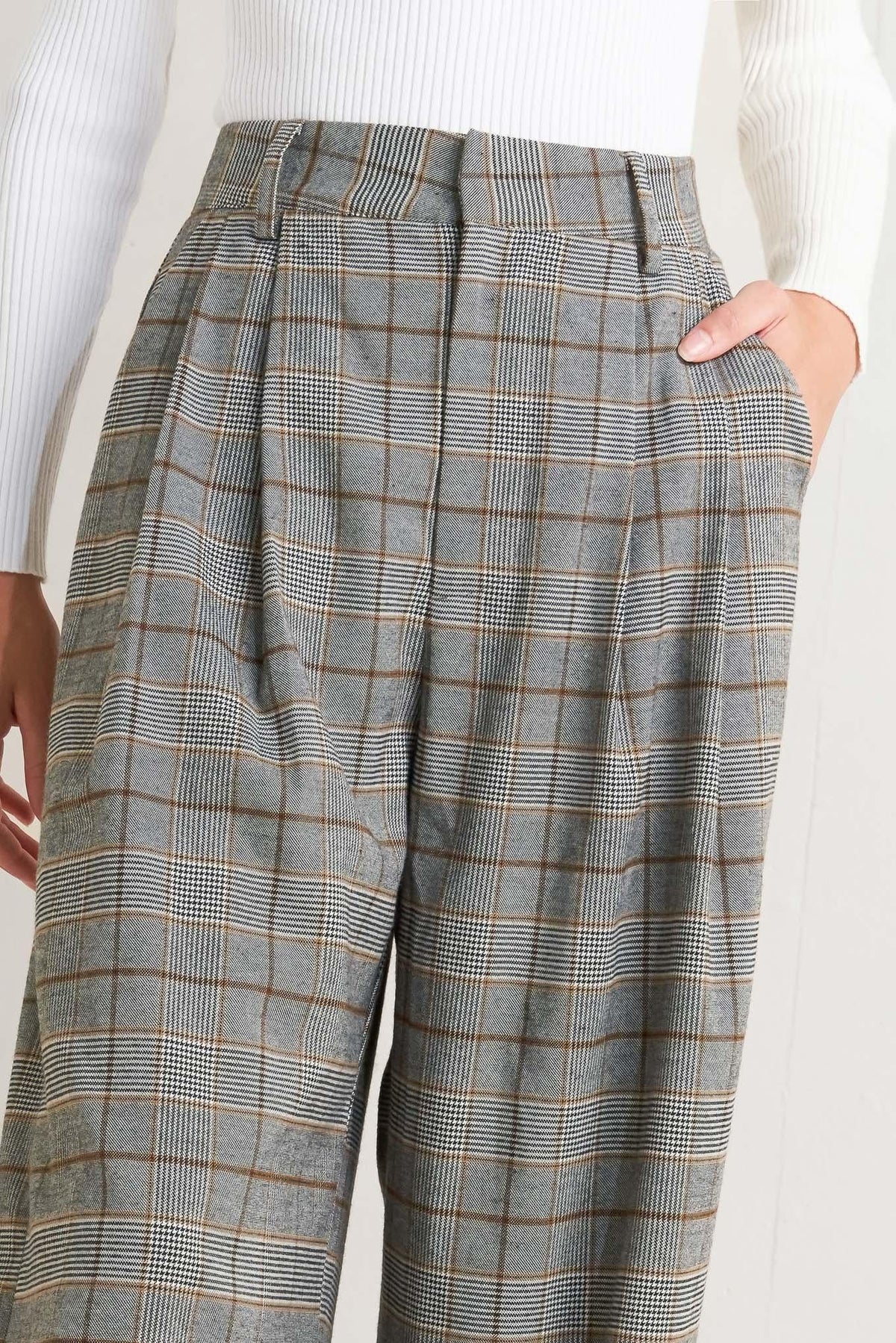 Flying Tomato woven plaid pants in brown and black, featuring a comfortable fit and stylish pattern.