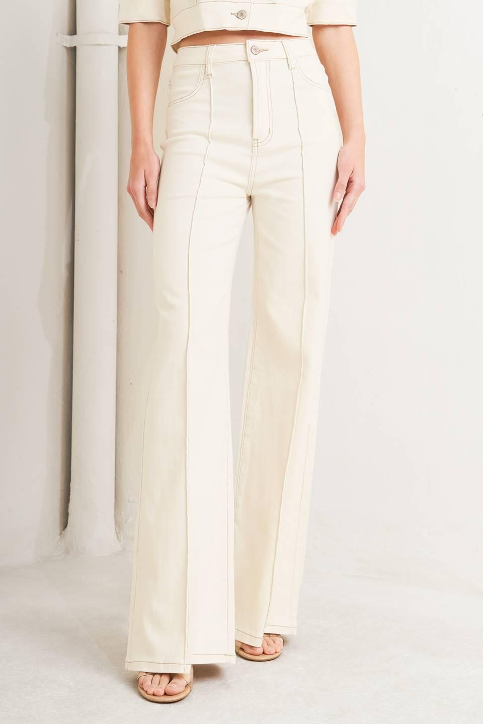 Light beige Flying Tomato modern neutral twill pants with a relaxed fit and classic waistband, displayed on a hanger.